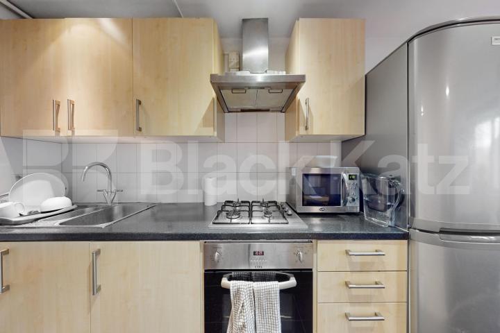 Top floor double studio with south facing balcony Tisdall House Barlow Street , Elephant and Castle